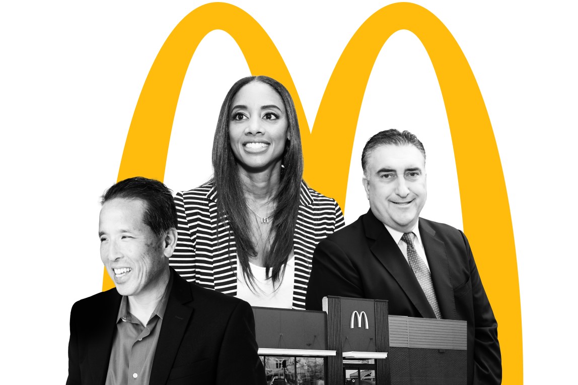 Three McDonald’s Franchisees around a restaurant and the McDonald’s golden arches behind them.